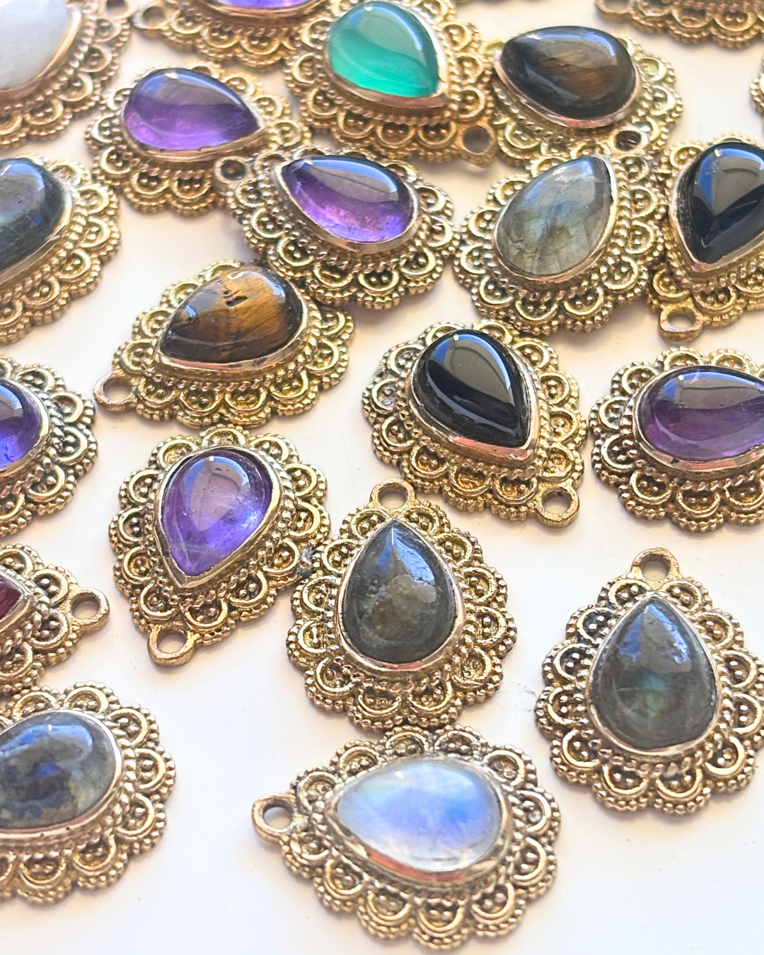 Teardrop Stone Pendant with Ornate Brass Setting